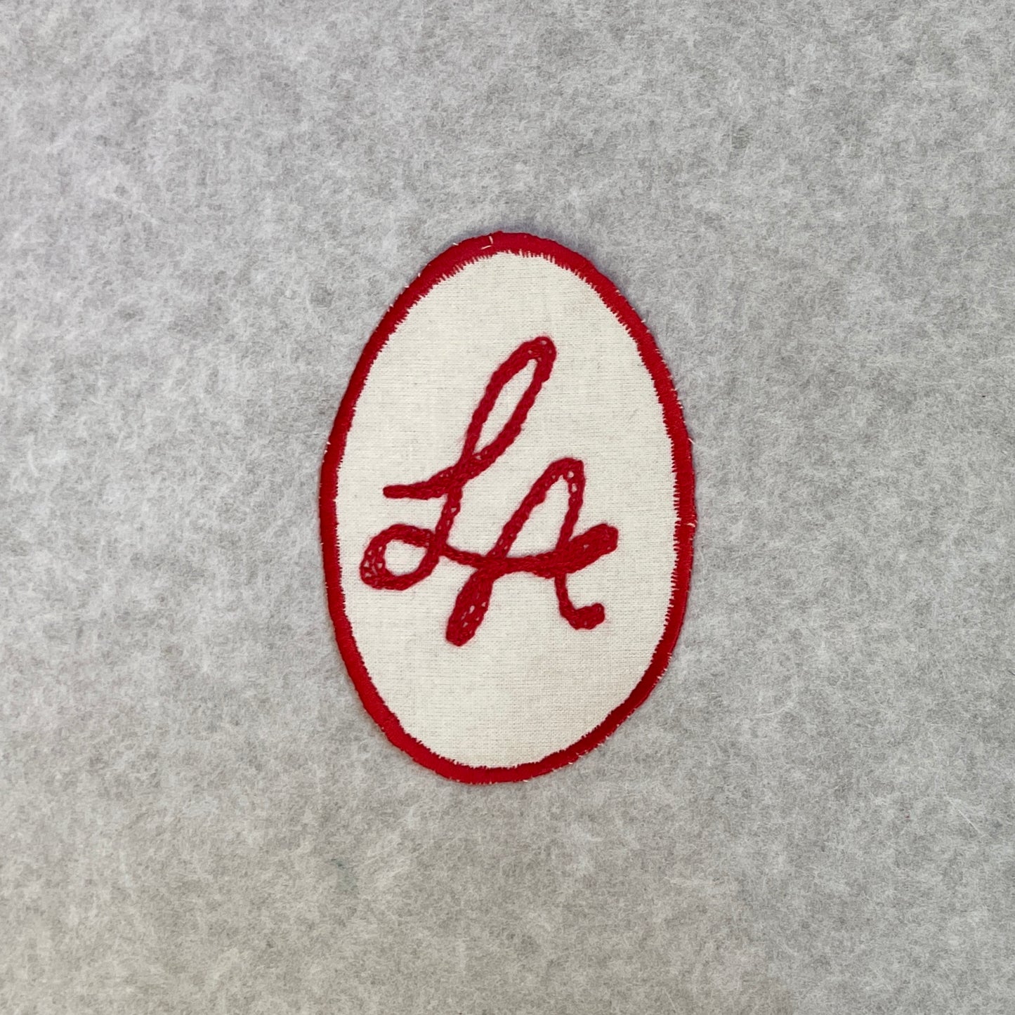 'LA' - Red on White